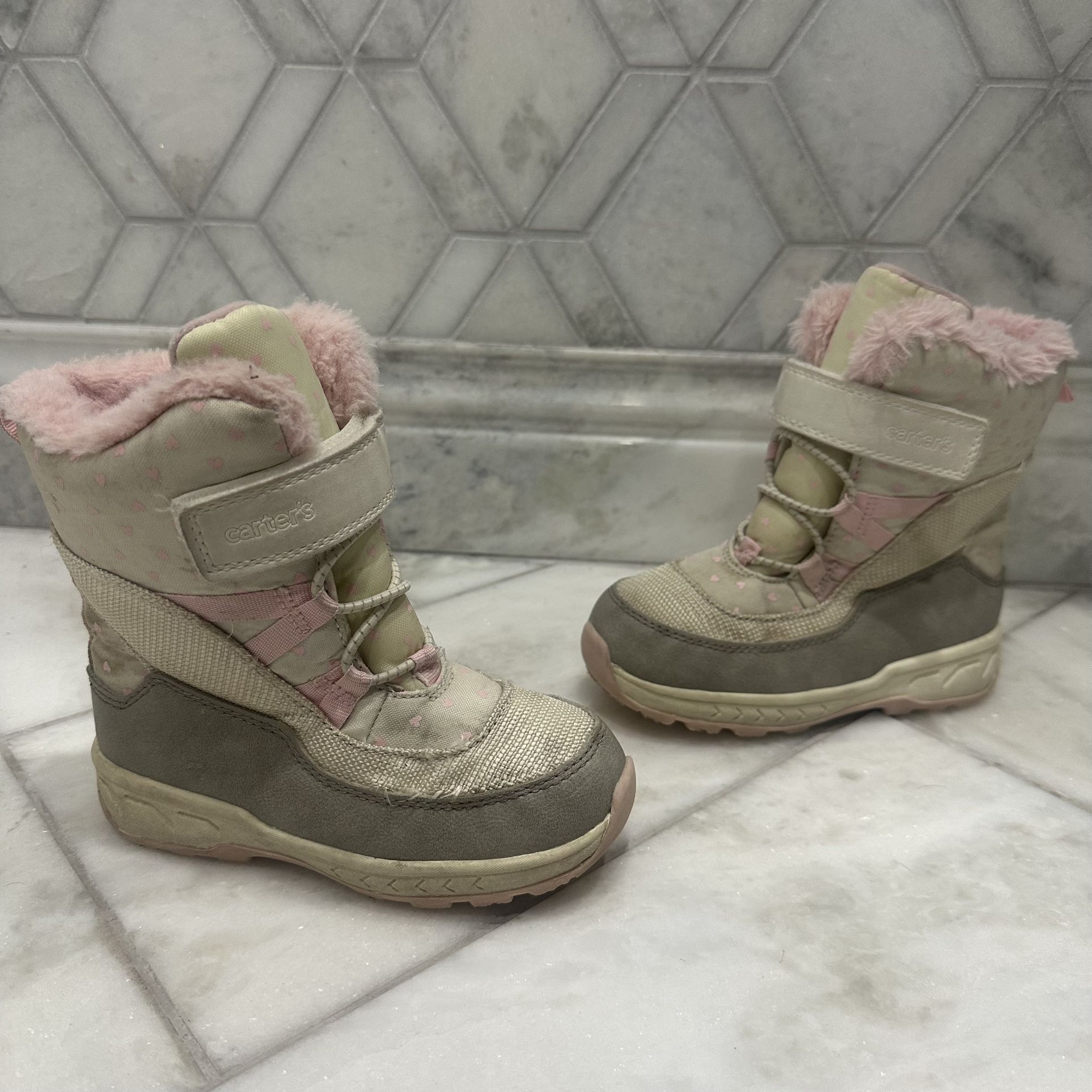 Size 11 Toddler Girl Faux Fur Winter Snow Boots Easy slip on style with Velcro Carter’s brand Size 11 toddler girl Super cute pink and ivory white co