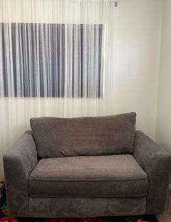 Loveseat sofa with pull out sleeper