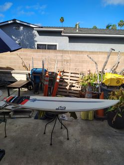 7" 6 lost puddel jumper surfboard( need repair)