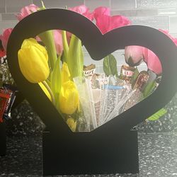 fresh rose and artificial flowers