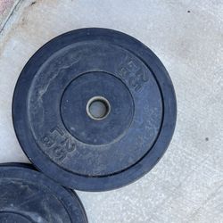 Rubber Olympic Weights 10s And 25s. 