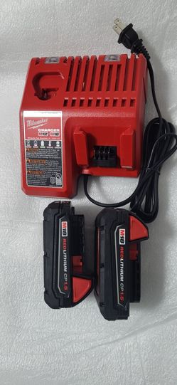 MILWAUKEE M18 BATTERY SET OF TWO PLUS CHARGER NEW
