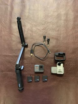 GoPro Hero 5 with 3 extra batteries and stick