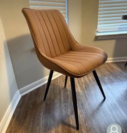 6 new cognac/camel dining chairs (new- in box)