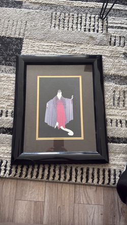 This is a framed art print by Erte titled 'Place de L'Opera'.