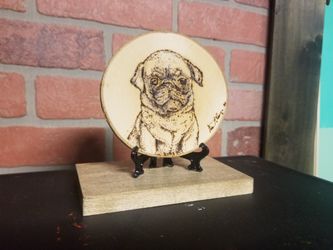 Pup burned on wood
