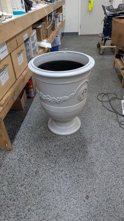 Large planter pot decorative. $100 firm.