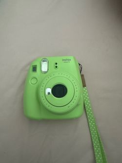lime green Fujifilm Instax Mini 9 instant camera