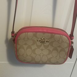 pink coach crossover 