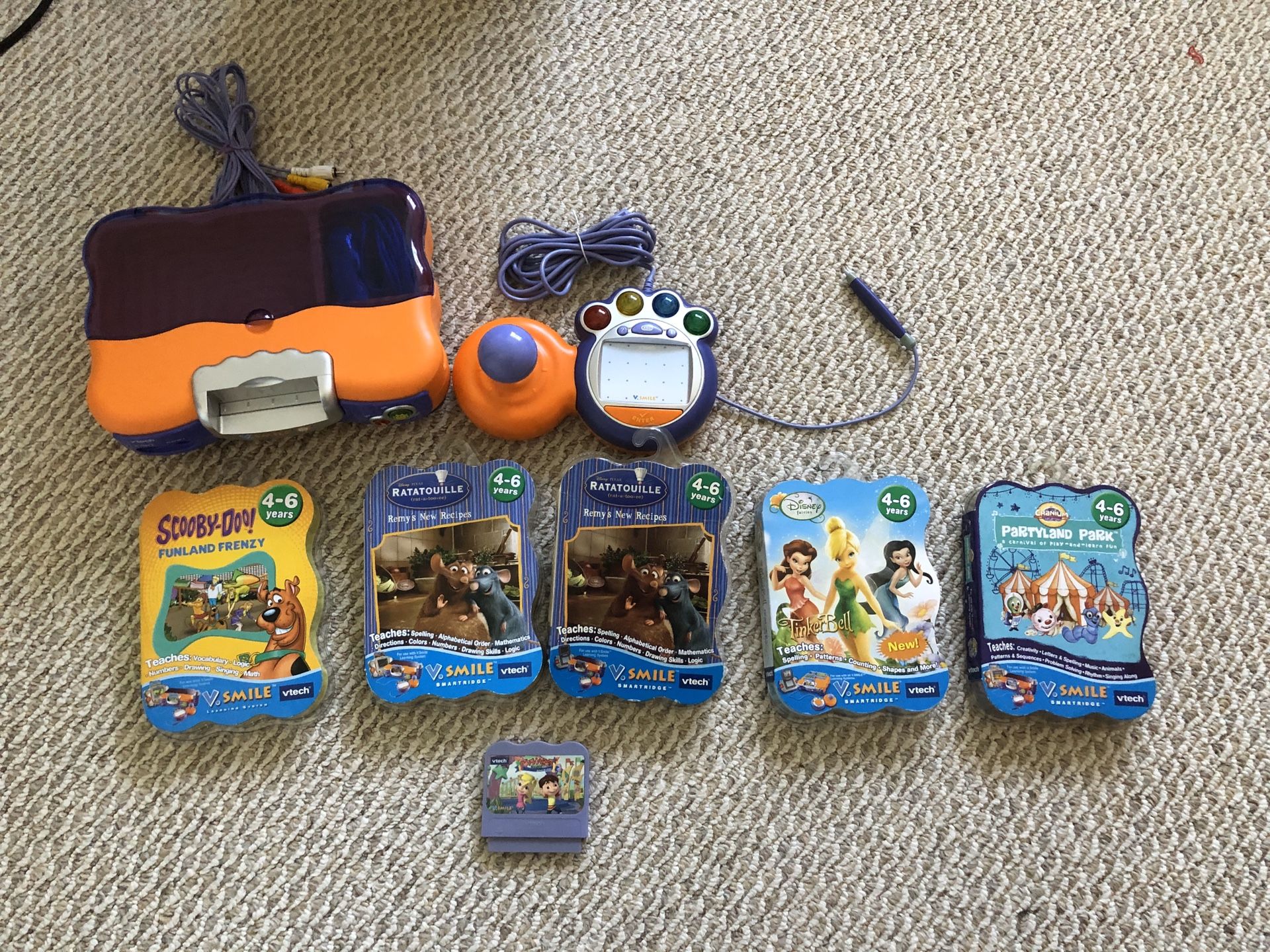 LAST CHANCE BEFORE ITS GOING TO GOODWILL.. Vtech learning system with 5 brand new games..