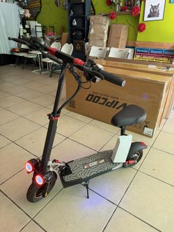 800W 10" Foldable Electric Scooter 48V 16AH E Scooter for Adults with Seat 32 mph. Range 30 Cap. 330lbs