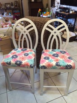 A pair of chairs. Seat height: 24 inches. Back of chair height: 41 1/2 inches. Depth: 16 inches. Width: 17 inches