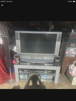 -Sony TV With Table And Surround Sound-