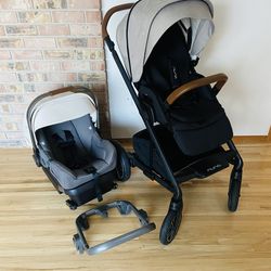 Nuna Stroller and Car Seat with white canopy