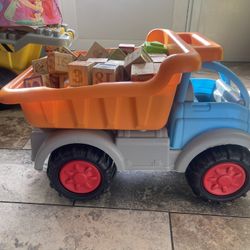 Dump Truck With Wooden Blocks