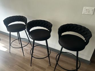 3 black barstools