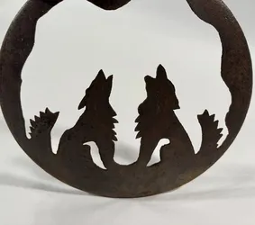 Vintage Howling Wolves Circular Metal Wall Art — Rust Patina