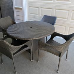 Outdoor patio wicker table with 4 chairs