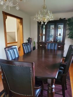 Dining table with 6 chairs  and cabinets