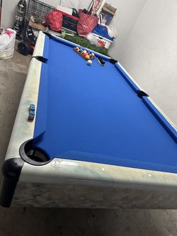 Pool Table with Blue Felt and Balls