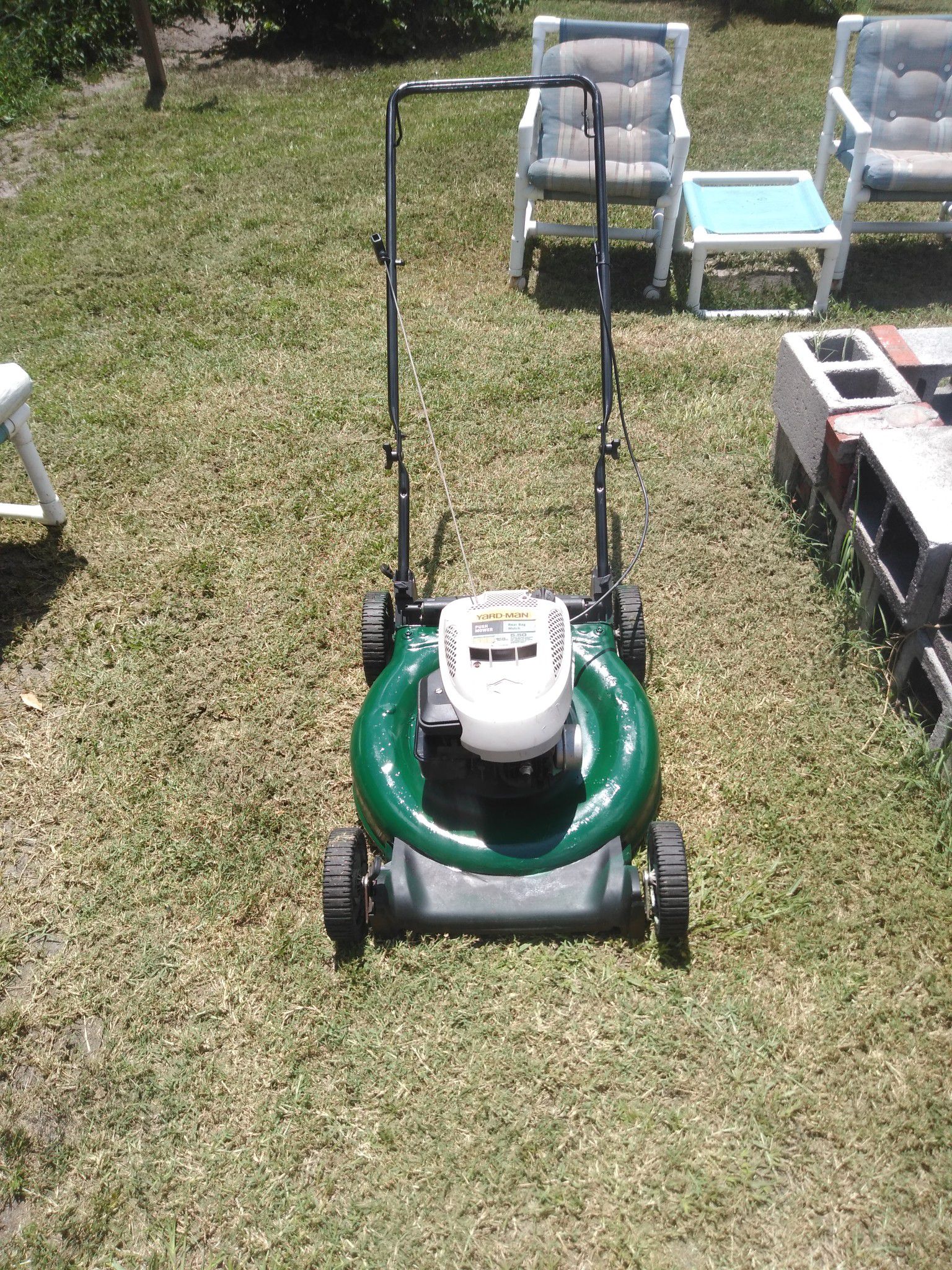 Good solid body push lawn mower works great new spark plug new oil new paint job looking for 80 or best offer