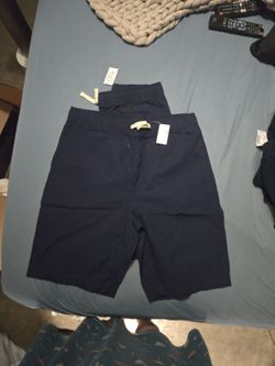 2  pairs navy size 18 shorts