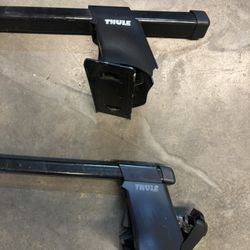 Pair Of 50” Square Thule Car Rack Bars With Feet