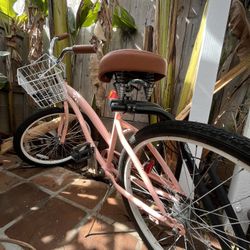 Pink beach cruiser with surf rack included 