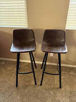 Brown leather bar stools