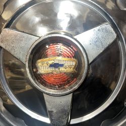 57" chevy bel air  hub caps original 