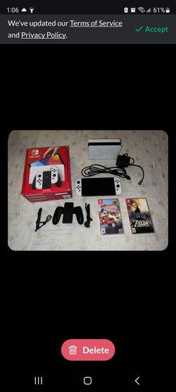 Great condition Nintendo Switch Oled w controller and 5 games