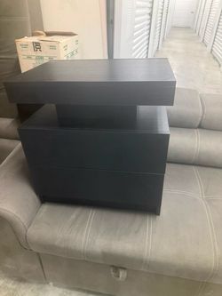 Black night stands with lights