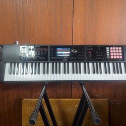 Roland FA-07 & Korg Mini. w/ Amp, Di boxes,cords,stand,gig bag and more!