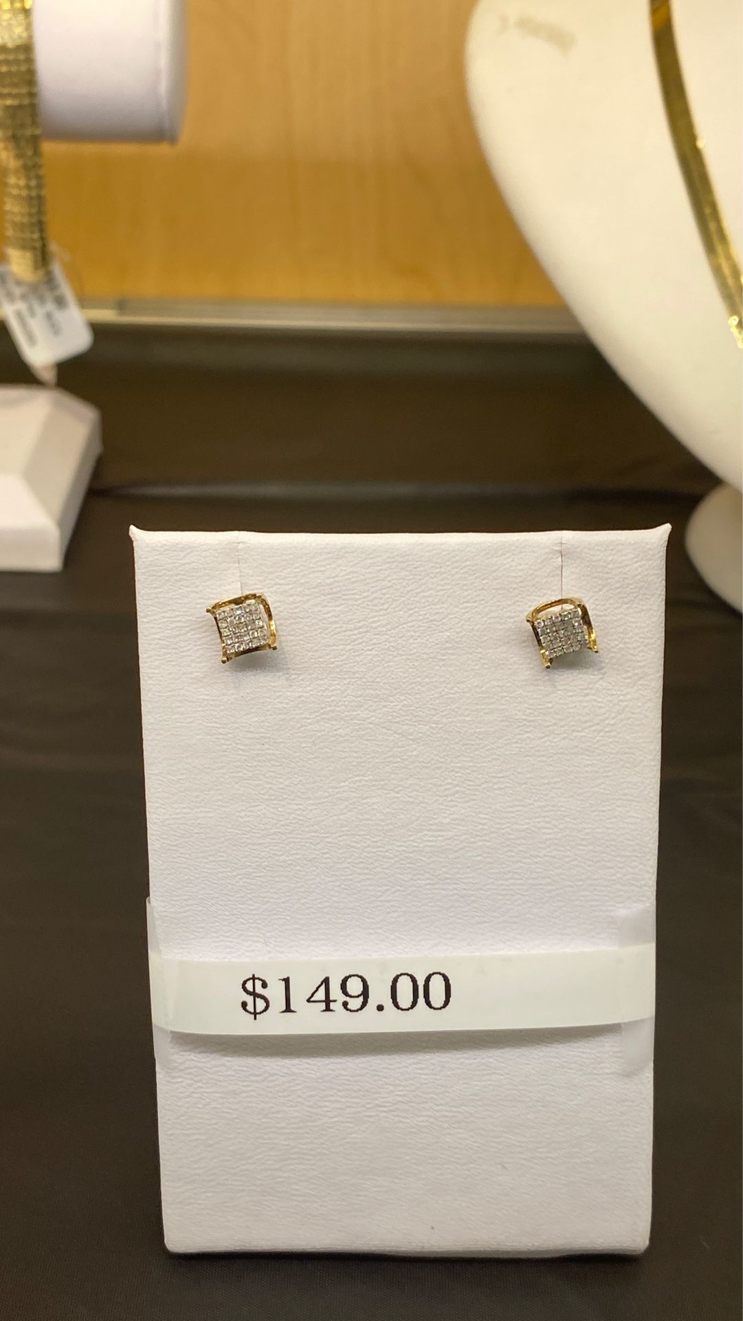 Gold and diamond earrings $149