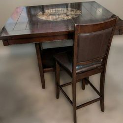 Juego de comedor alto con centro de mármol GIRATORIO y 4 sillas.