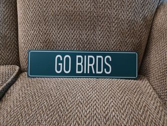 "GO BIRDS"  METAL SIGN.  16" X 4".  NEW.  PICKUP ONLY.