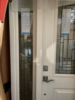 Avatar hurricane door with side light measuring 80 inches high by 51 inches wide 2500$ fi