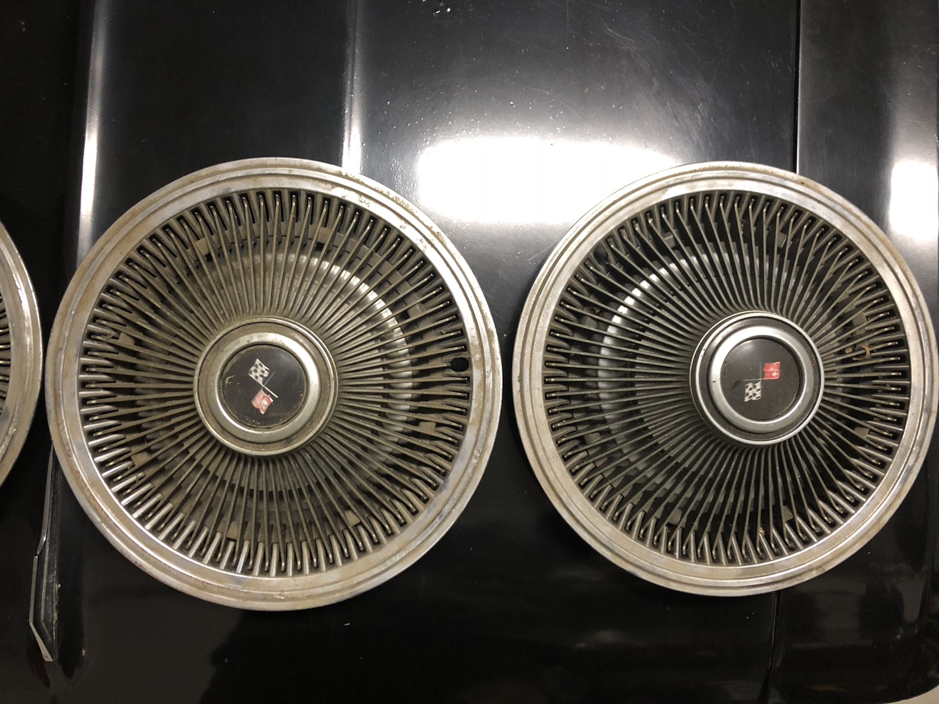 Old Chevy Corvette hubcaps