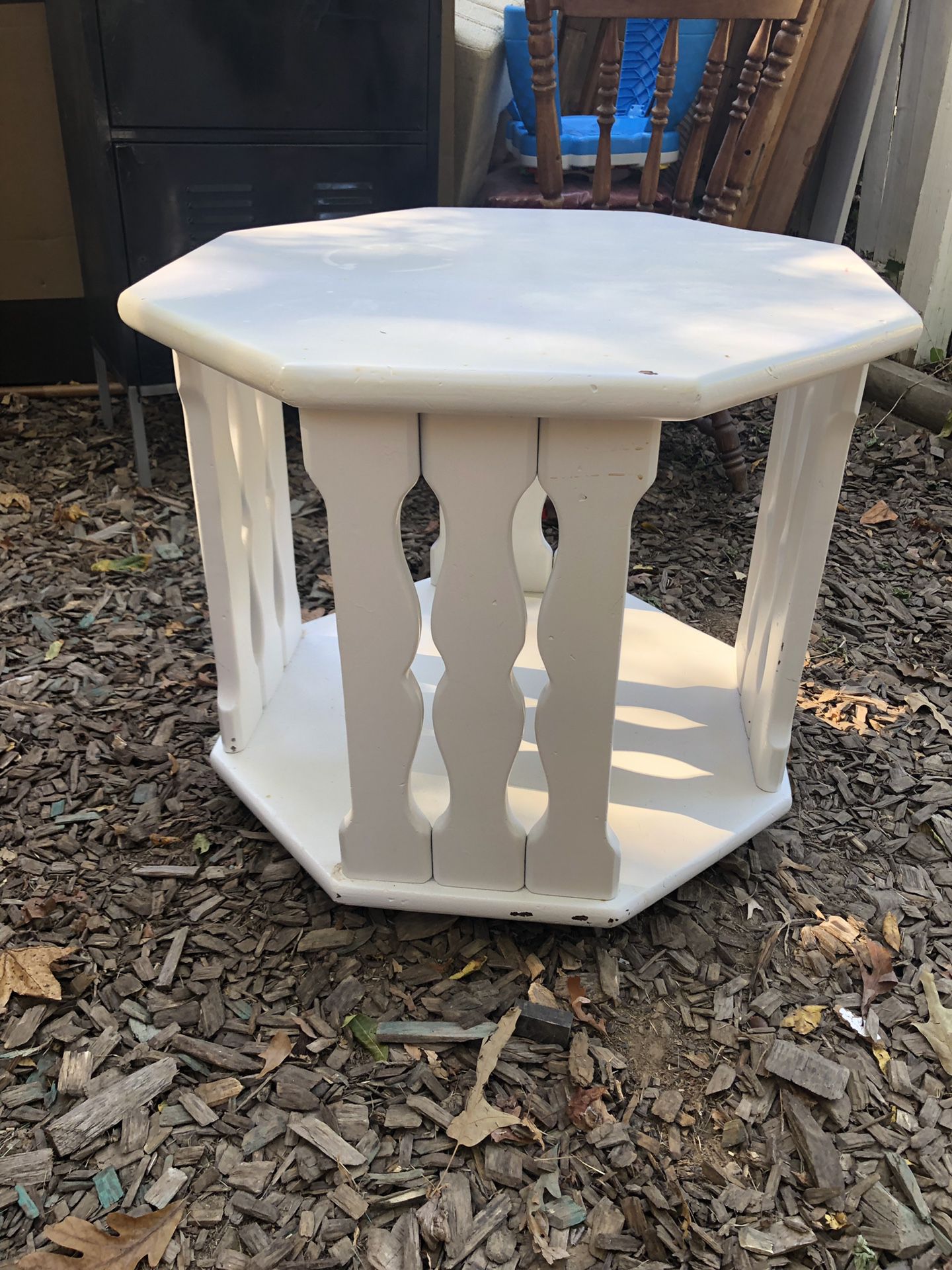 White octagon table that swivels