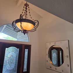 Interior chandelier an exterior sconces to match