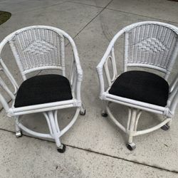 Two Vintage Rattan and Wicker Rolling/ Swivel Chairs