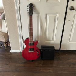 les Paul guitar with amp