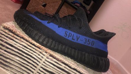 Authentic Adidas Yeezy Boost 350 V2 sneakers in the Dazzling Blue colorway.