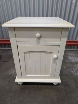 Charming Cream Wood Nightstand with Drawer and Cabinet