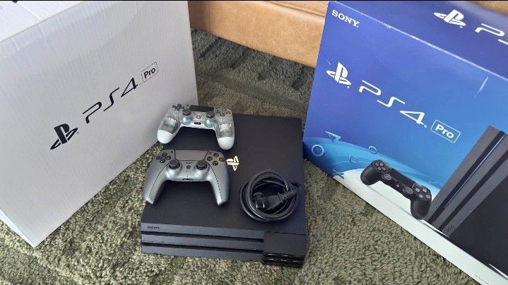 PS4 Pro 1TB Black w/ 2 Controllers in Box