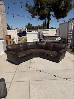 Dark Brown Leather Sectional Sofa with Nailhead Trim - One Rip