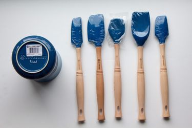 Brand new Le creuset Revolution utensil set