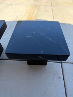 Black faux marble side table