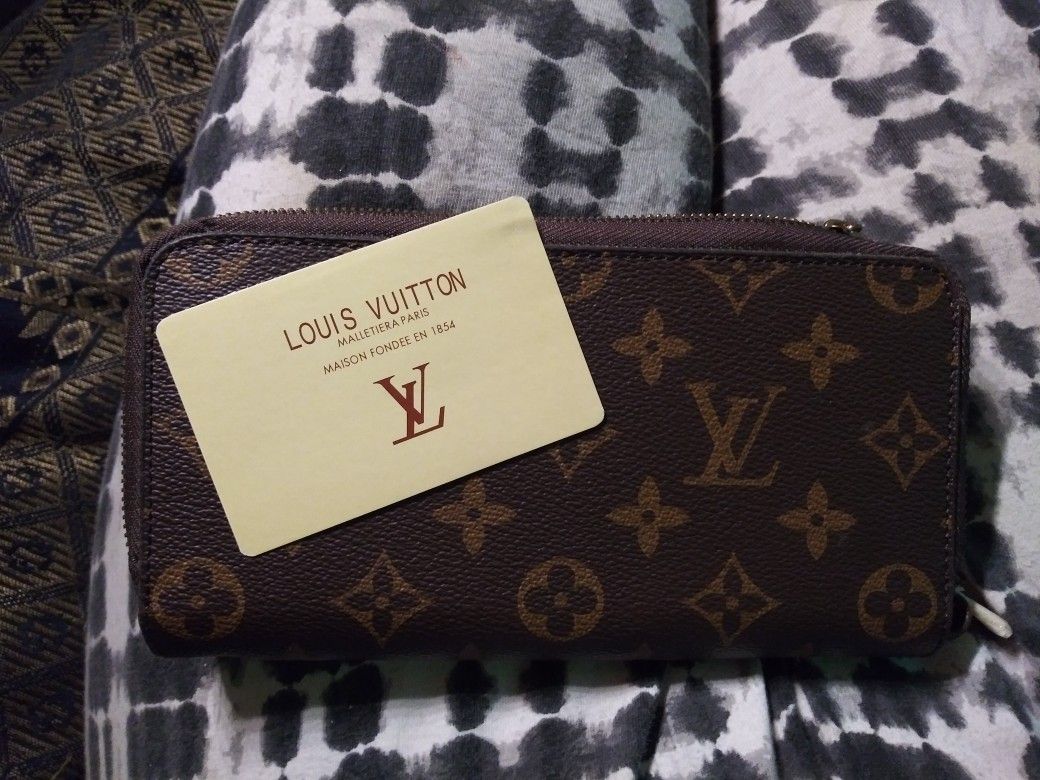 Louis Vuitton wallet, clutch, and purse