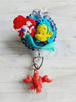 Ariel, Flounder and Sebastián ID holder